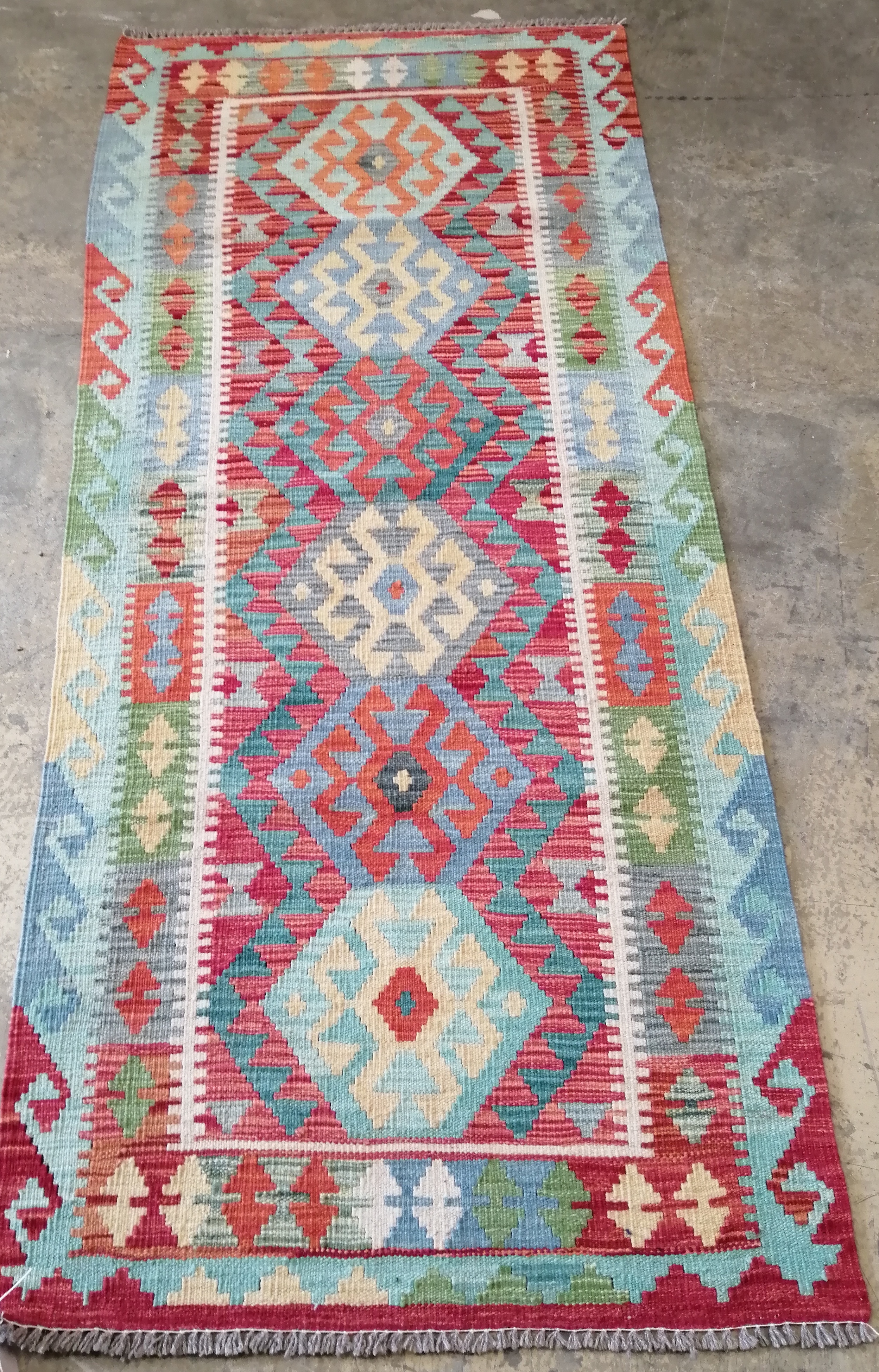 An Anatolian style Afghan polychrome flatweave runner, 200 x 86cm